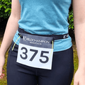 Velochampion Adjustable Elastic Running Number Waist Belt. Stretch Fit Black with Buckle Fastening