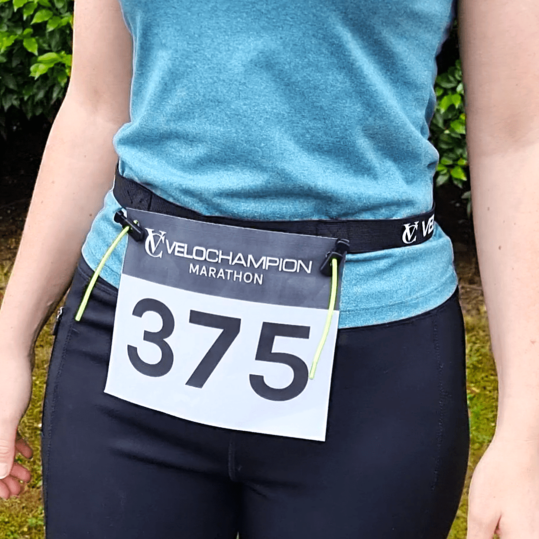 Velochampion Adjustable Elastic Running Number Waist Belt. Stretch Fit Black with Buckle Fastening
